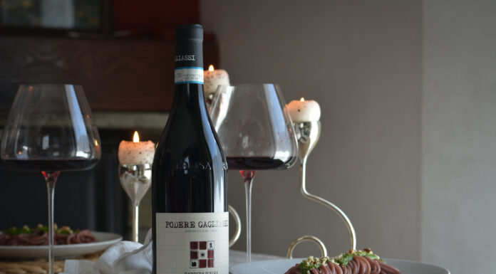 BUCATINI “UBRIACHI” AL VINO ROSSO, PESTO DI RUCOLA E MANDORLE